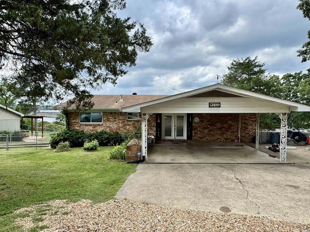 115 Ledgerock Rd, Hot Springs, AR 71913 - ranch-style home featuring french doors, brick siding, and driveway