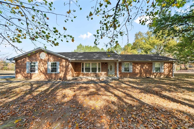 ranch-style home with brick siding