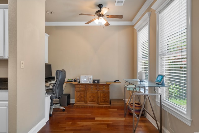 office space featuring wood finished floors, a ceiling fan, crown molding, visible vents, and baseboards