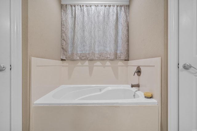 bathroom featuring a garden tub