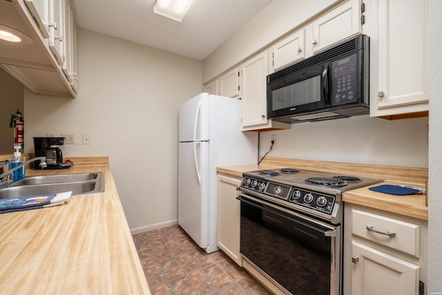 5371 Central Ave Unit 5D, Hot Springs, AR 71913 - kitchen with electric range oven, a sink, black microwave, and white cabinets