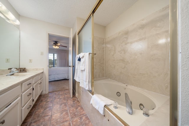 5371 Central Ave Unit 5D, Hot Springs, AR 71913 - ensuite bathroom with tile patterned flooring, vanity, a textured ceiling, and ensuite bathroom