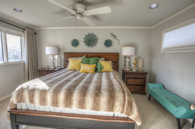 bedroom featuring carpet flooring, a ceiling fan, and crown molding