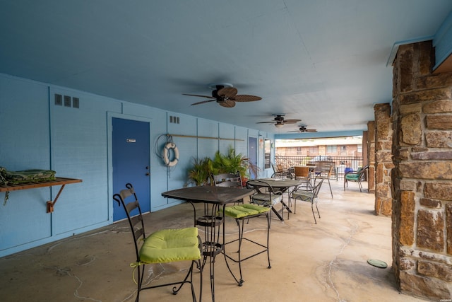 view of patio with visible vents and ceiling fan