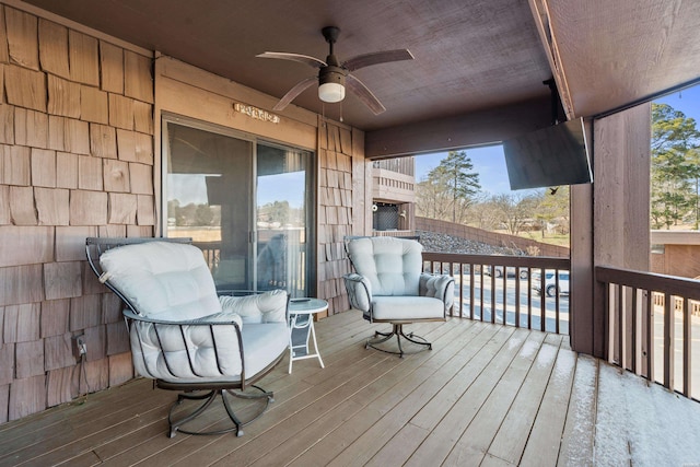 deck featuring a ceiling fan