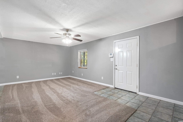 102 Brandiles Ln, Hot Springs, AR 71913 - empty room with a textured ceiling, carpet flooring, a ceiling fan, and baseboards