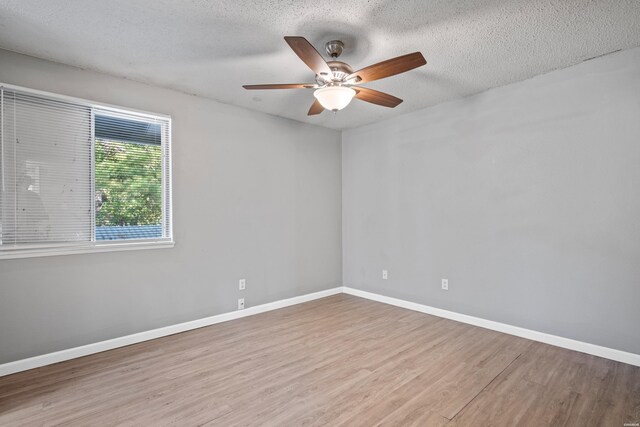102 Brandiles Ln, Hot Springs, AR 71913 - spare room with ceiling fan, a textured ceiling, baseboards, and wood finished floors