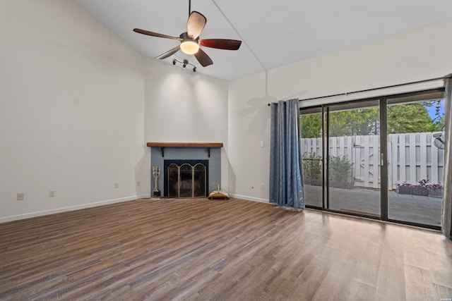 12 Beldoir Ct Unit 12, Hot Springs, AR 71901 - unfurnished living room featuring wood finished floors, a ceiling fan, and a fireplace