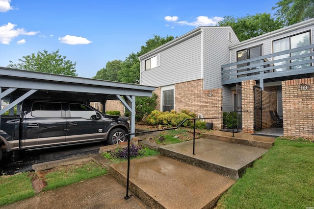 12 Beldoir Ct Unit 12, Hot Springs, AR 71901 - view of home's exterior featuring brick siding and a balcony