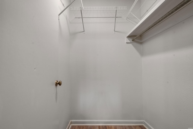 12 Beldoir Ct Unit 12, Hot Springs, AR 71901 - walk in closet featuring wood finished floors