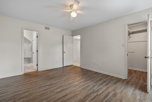 12 Beldoir Ct Unit 12, Hot Springs, AR 71901 - unfurnished bedroom with wood finished floors, a walk in closet, a ceiling fan, and ensuite bathroom