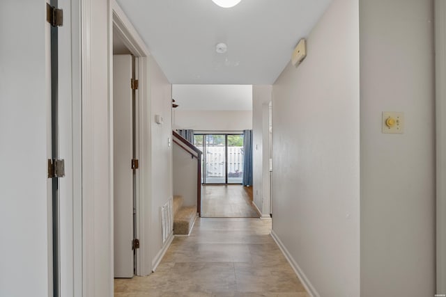12 Beldoir Ct Unit 12, Hot Springs, AR 71901 - hallway featuring baseboards and stairs
