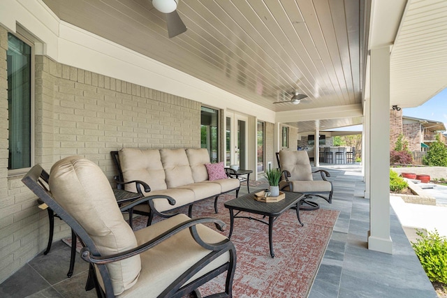 view of patio / terrace with ceiling fan and outdoor lounge area