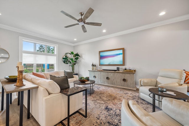 living area featuring recessed lighting, wood finished floors, ceiling fan, baseboards, and crown molding