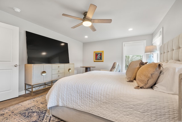 bedroom featuring wood finished floors, ceiling fan, and recessed lighting