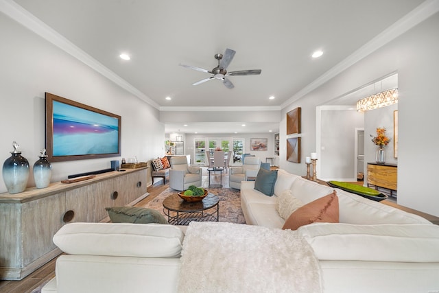 living room featuring recessed lighting, wood finished floors, a ceiling fan, and crown molding