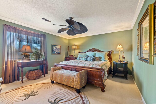 bedroom featuring a textured ceiling, light colored carpet, visible vents, baseboards, and crown molding