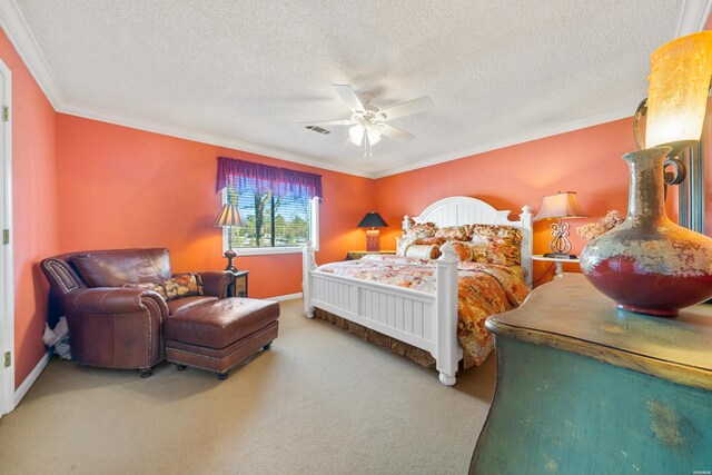 carpeted bedroom featuring ceiling fan, a textured ceiling, and crown molding