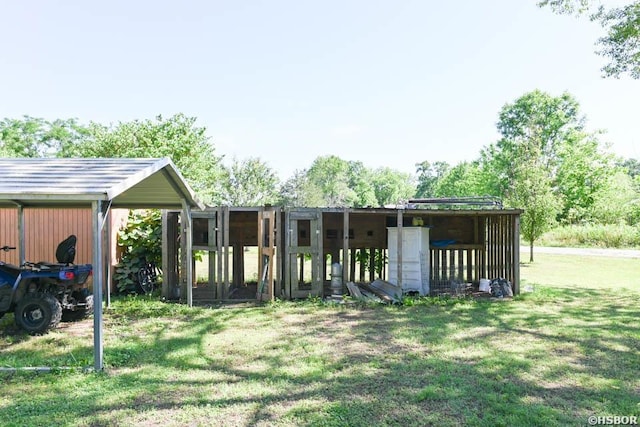 142 Taylor Loop, Oden, AR 71961 - view of grassy yard with a carport