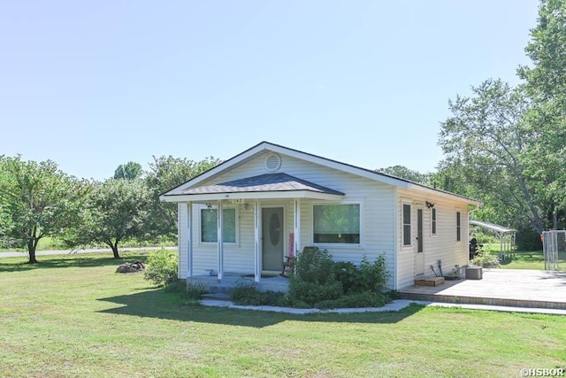 142 Taylor Loop, Oden, AR 71961 - view of front of house with a porch, a front yard, and a wooden deck