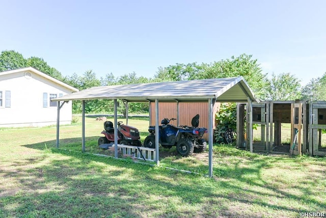 142 Taylor Loop, Oden, AR 71961 - view of grassy yard featuring a carport and an outdoor structure