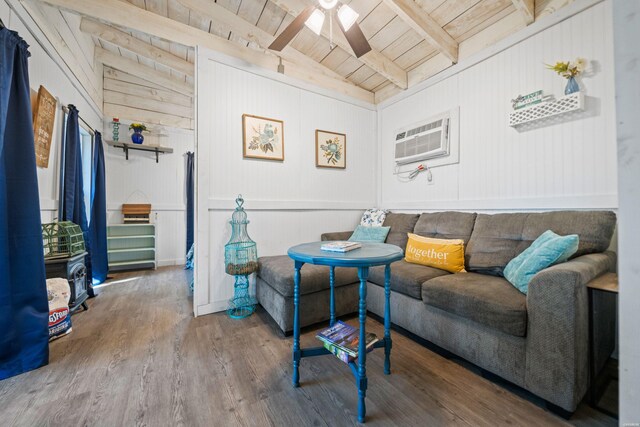 living area featuring ceiling fan, lofted ceiling with beams, wood finished floors, wood ceiling, and an AC wall unit