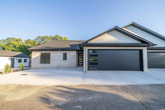 168 Krause Ln Unit A & B, Hot Springs, AR 71913 - view of front of house with a garage, brick siding, and concrete driveway