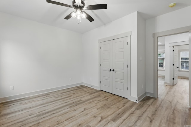 211 Cromwell Ct, Hot Springs, AR 71901 - unfurnished bedroom with light wood-type flooring, baseboards, a ceiling fan, and a closet