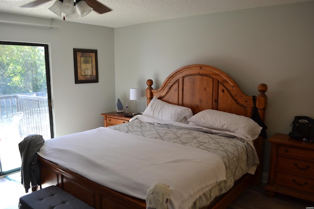 bedroom featuring a textured ceiling, access to outside, and ceiling fan