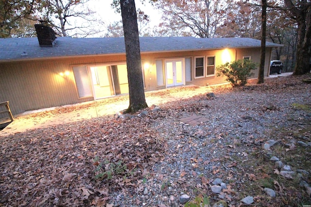 1 Alora Ln, Hot Springs Village, AR 71909 - rear view of house with a chimney and french doors