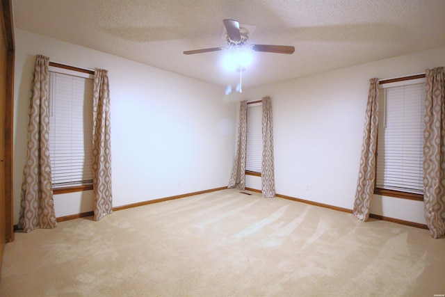 1 Alora Ln, Hot Springs Village, AR 71909 - empty room featuring a textured ceiling, baseboards, and light colored carpet