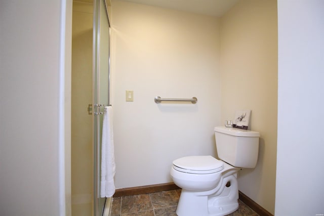 1 Alora Ln, Hot Springs Village, AR 71909 - full bathroom featuring toilet, a stall shower, and baseboards