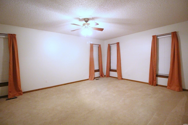 1 Alora Ln, Hot Springs Village, AR 71909 - empty room with light colored carpet, a textured ceiling, and baseboards