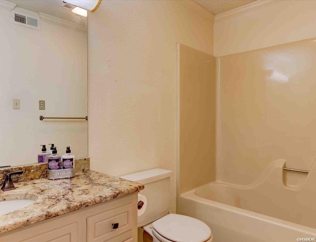 bathroom featuring visible vents, toilet, ornamental molding, tub / shower combination, and vanity