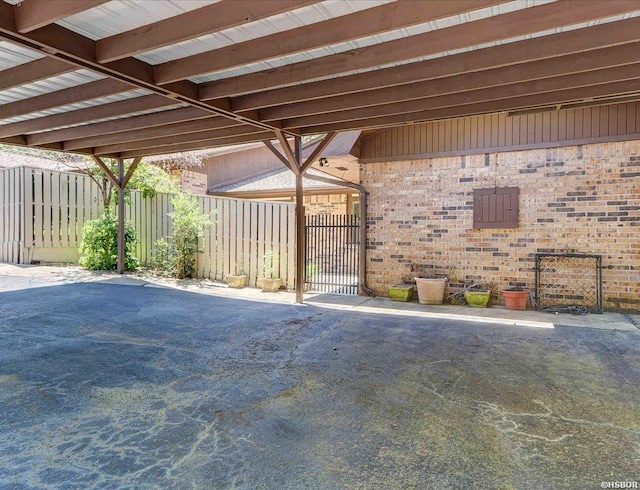 view of patio featuring fence