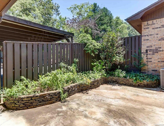 view of patio with fence