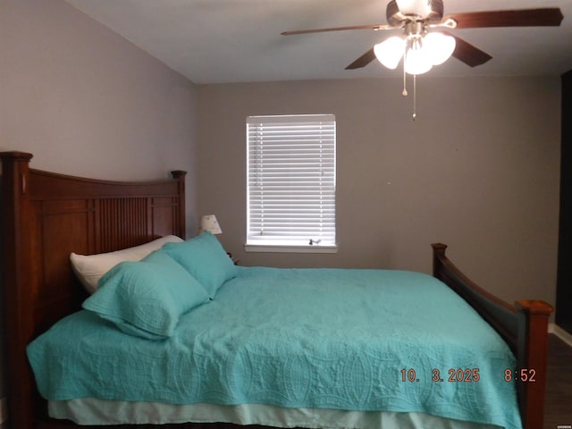 bedroom featuring ceiling fan