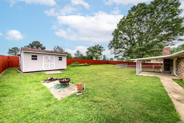 221 San Juan Dr, Hot Springs, AR 71913 - fenced backyard featuring a storage unit and an outdoor fire pit