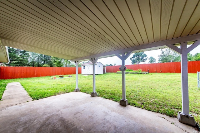 221 San Juan Dr, Hot Springs, AR 71913 - fenced backyard featuring a patio area and a shed