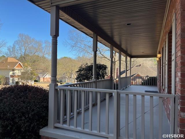 view of patio featuring a porch