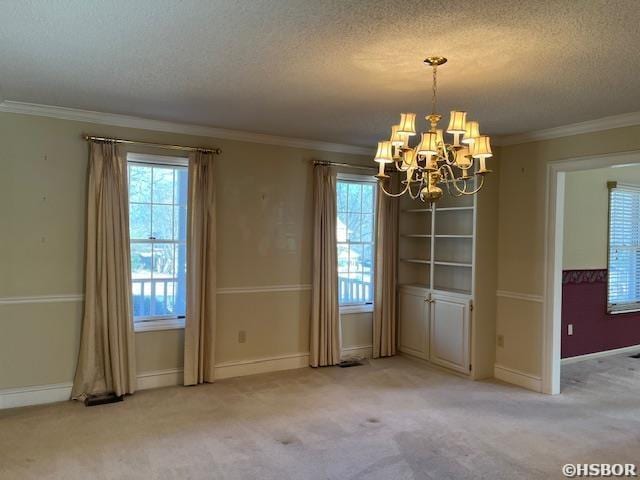 unfurnished dining area featuring light carpet, ornamental molding, and a chandelier