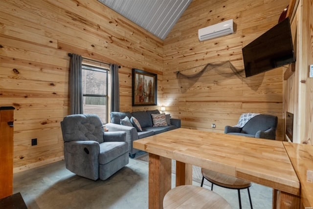 1136 Arlie Moore Rd, Bismarck, AR 71929 - interior space with high vaulted ceiling, wood walls, an AC wall unit, and concrete floors