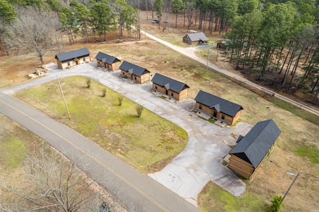 birds eye view of property with a rural view