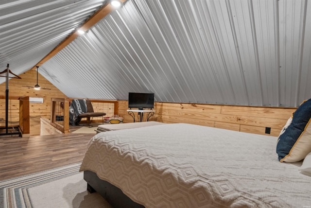 1136 Arlie Moore Rd, Bismarck, AR 71929 - bedroom with lofted ceiling, wood finished floors, and wood walls