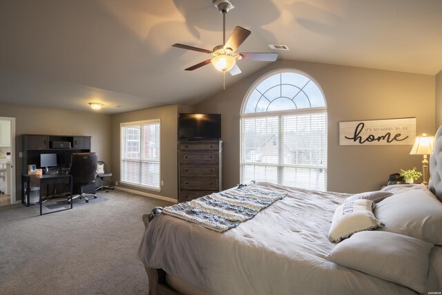 bedroom with lofted ceiling, ceiling fan, and carpet flooring