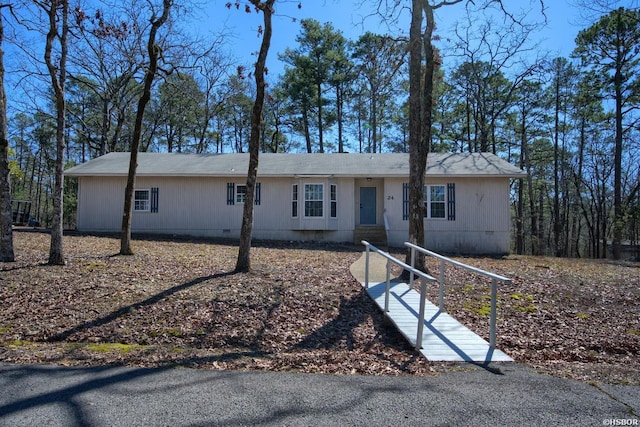 view of front of home with crawl space