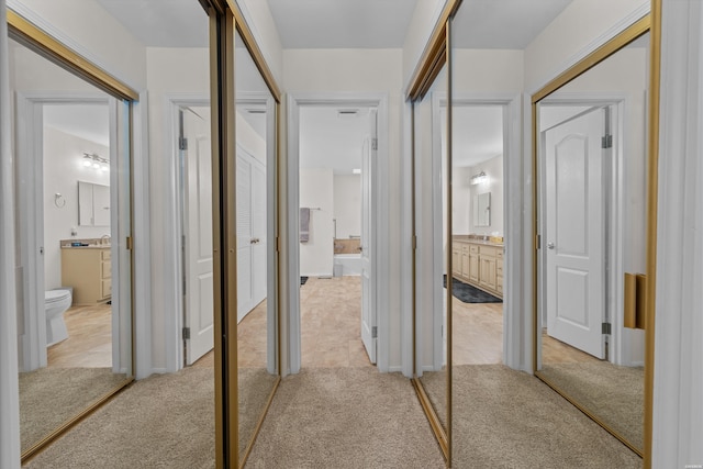 18 Escondite Ln, Hot Springs Village, AR 71909 - hallway featuring light carpet