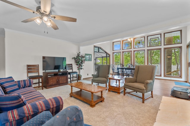 18 Escondite Ln, Hot Springs Village, AR 71909 - living area with crown molding, a ceiling fan, and wood finished floors