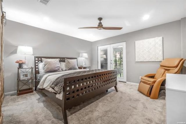 carpeted bedroom with visible vents, baseboards, a ceiling fan, access to exterior, and french doors