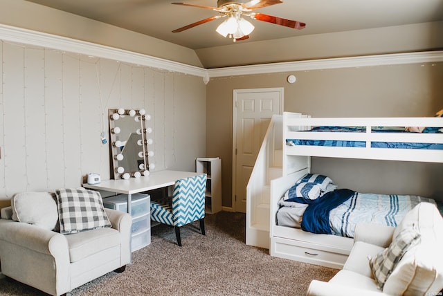 bedroom featuring vaulted ceiling, carpet flooring, and a ceiling fan